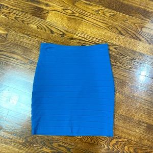 Teal pencil skirt with zip enclosure on the back